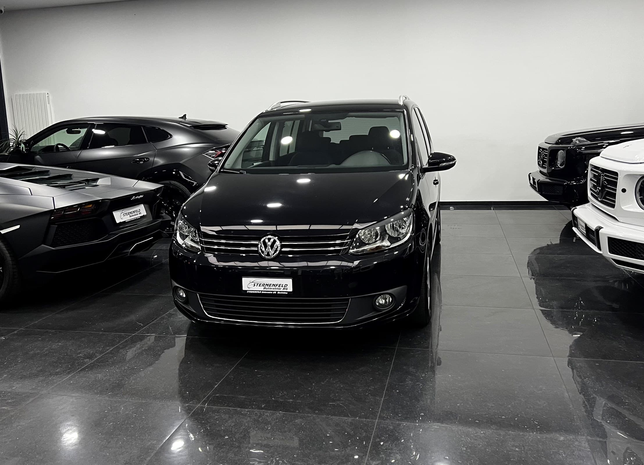 VW Touran 2.0 TDI Comfortline — Occasion bei Sternenfeld Autocenter, Birsfelden
